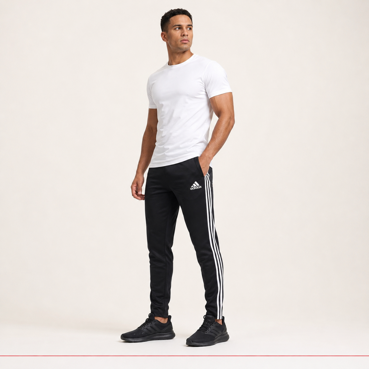 Male model wearing adidas alternate style black training sweatpants