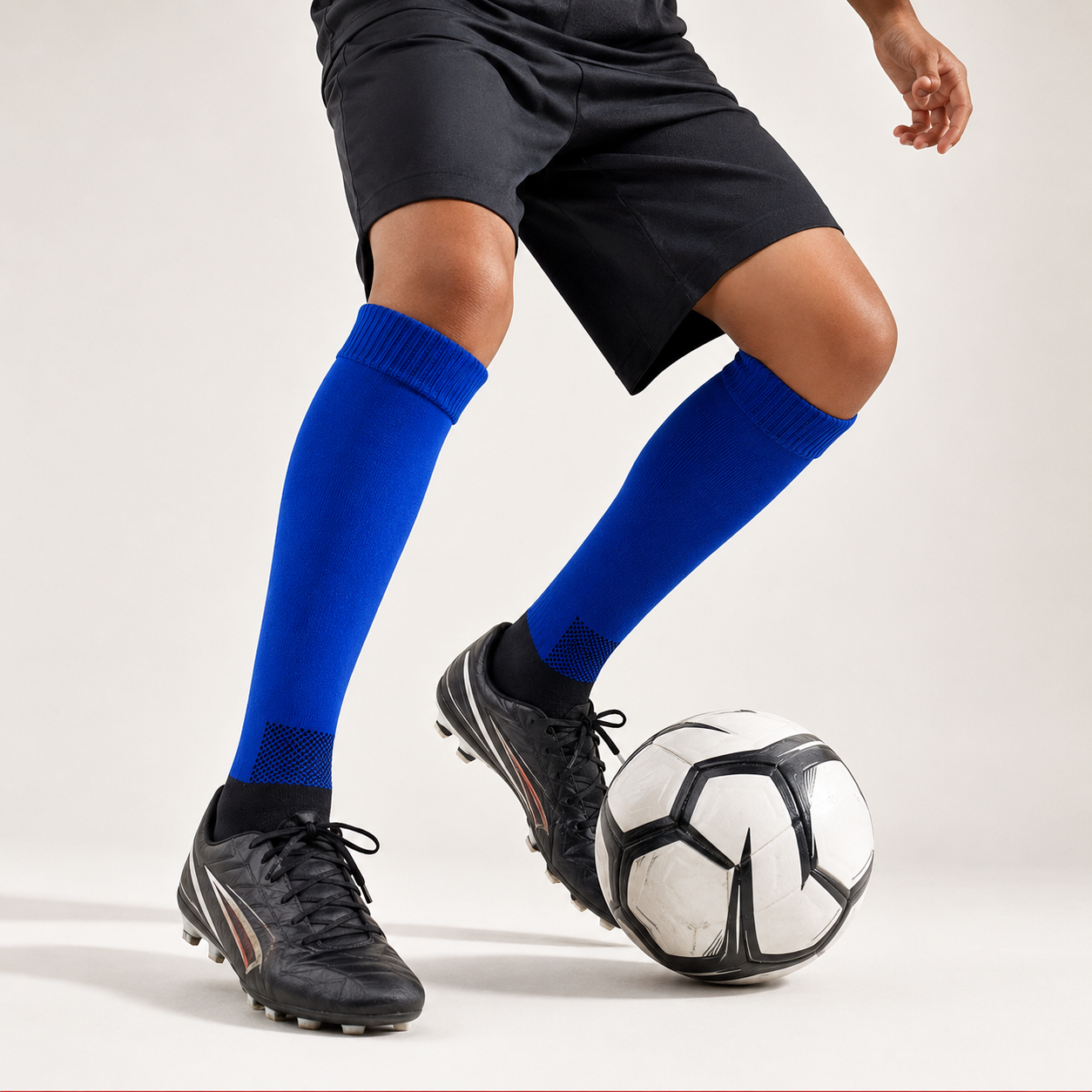 Child football player wearing ProShield blue socks