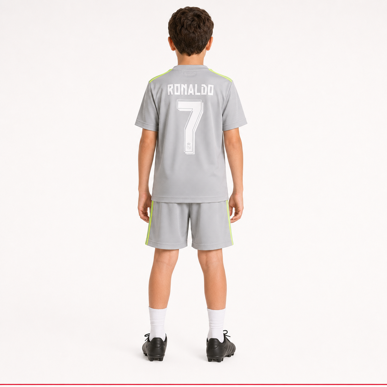 Child model wearing Real Madrid 2018 kids football kit back view Ronaldo 7