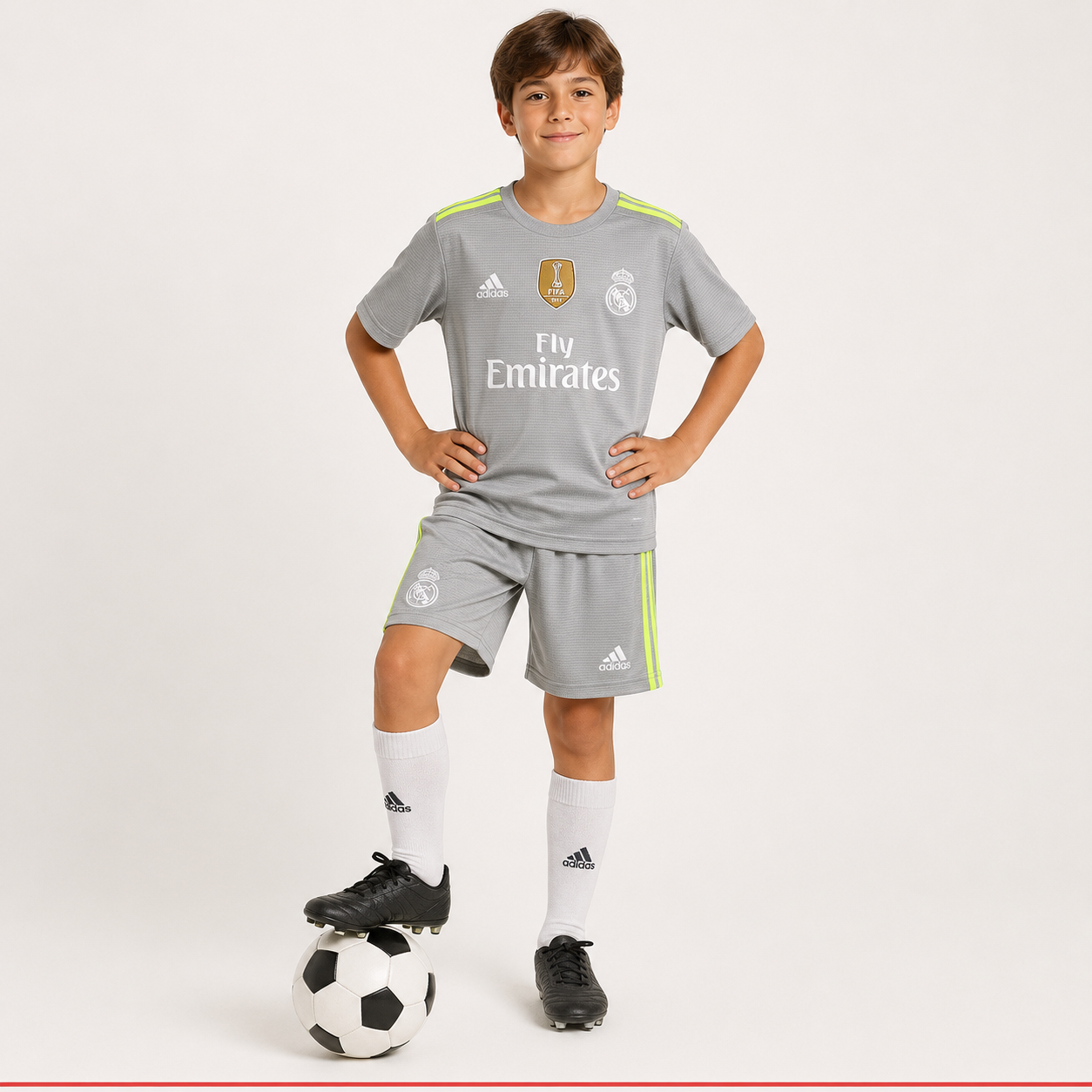 Child model wearing Real Madrid 2018 kids football kit