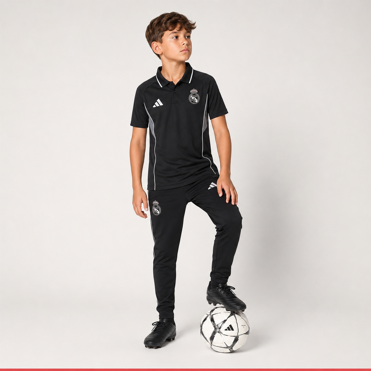 Child model wearing Real Madrid kids training kit